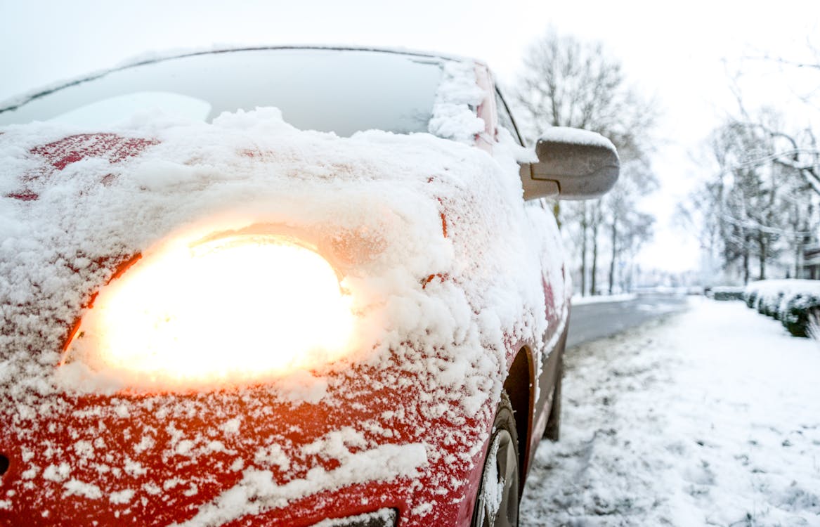 Free Snow Covered Red Sedan Stock Photo